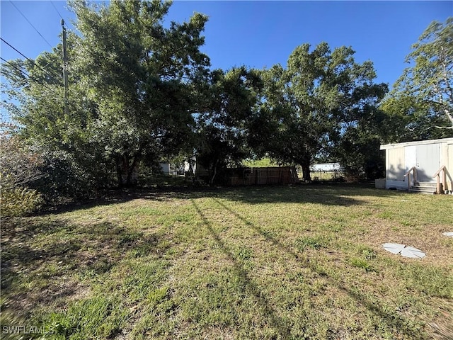 view of yard with fence