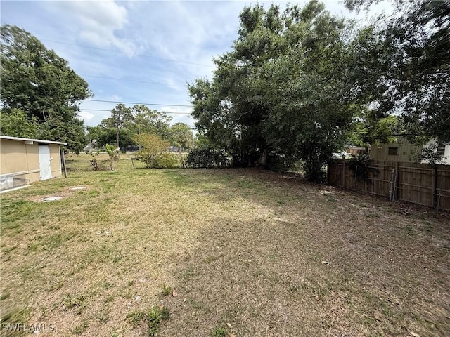 view of yard with fence