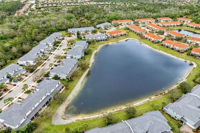 bird's eye view with a water view and a residential view