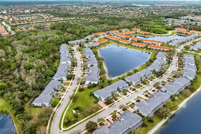 aerial view featuring a residential view and a water view