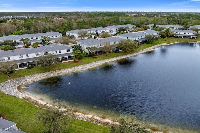 bird's eye view with a residential view and a water view