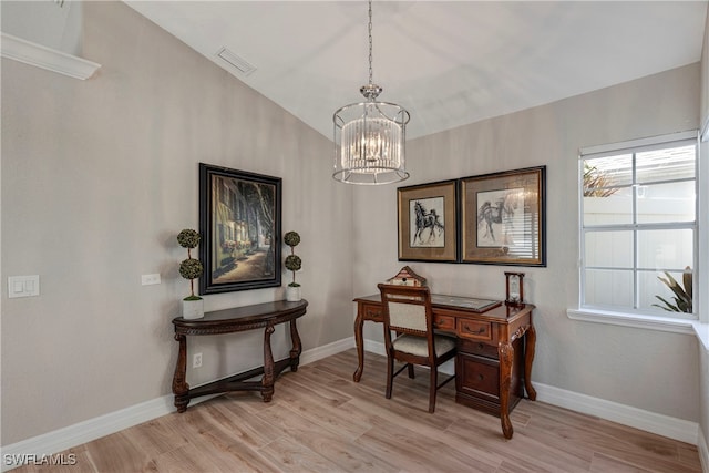 home office featuring light wood-type flooring, visible vents, and baseboards