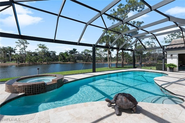 view of pool featuring a patio area, glass enclosure, a water view, and a pool with connected hot tub