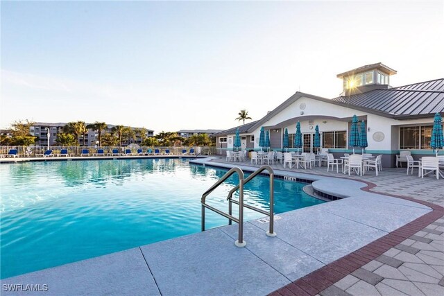 community pool featuring a patio