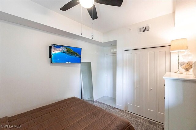 unfurnished bedroom featuring a ceiling fan, a closet, and visible vents