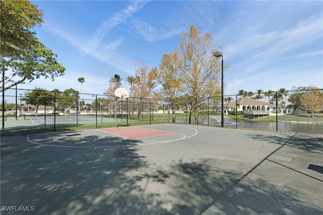 view of sport court with community basketball court and fence