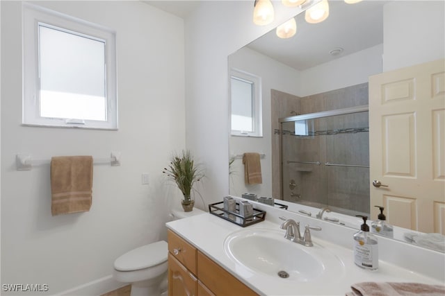 full bath with toilet, a tile shower, and vanity