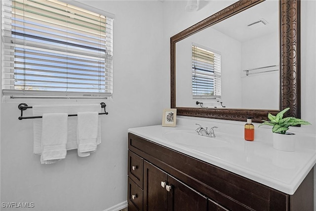 7431 Barrancas Ave, Bokeelia, FL 33922 - bathroom featuring visible vents and vanity