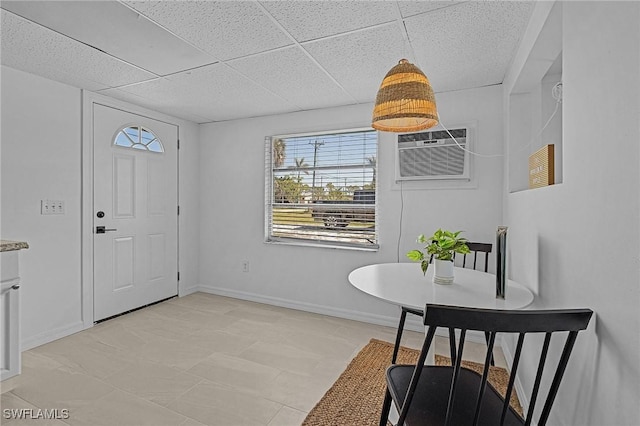 7431 Barrancas Ave, Bokeelia, FL 33922 - foyer entrance with a drop ceiling, a wall mounted air conditioner, and baseboards