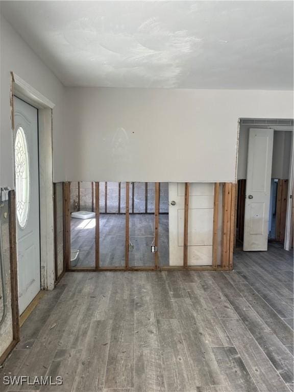 unfurnished room featuring wood finished floors