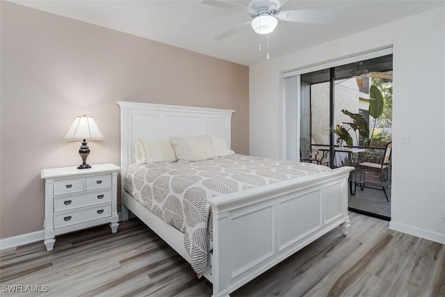 bedroom featuring access to exterior, baseboards, and light wood-style floors