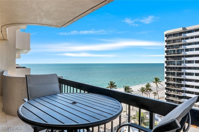 balcony featuring a water view