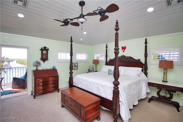 bedroom featuring lofted ceiling, access to outside, carpet flooring, and visible vents