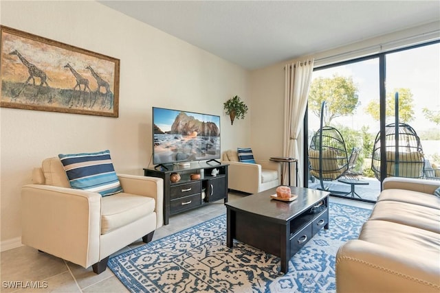 14127 Oviedo Pl, Fort Myers, FL 33905 - living room with a wealth of natural light and light tile patterned flooring