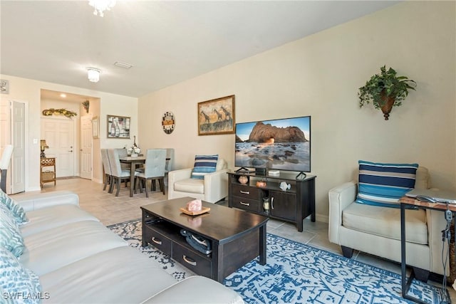 14127 Oviedo Pl, Fort Myers, FL 33905 - living area featuring baseboards and tile patterned floors