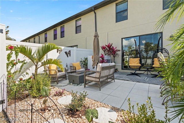 14127 Oviedo Pl, Fort Myers, FL 33905 - view of patio / terrace featuring a fenced backyard and an outdoor hangout area