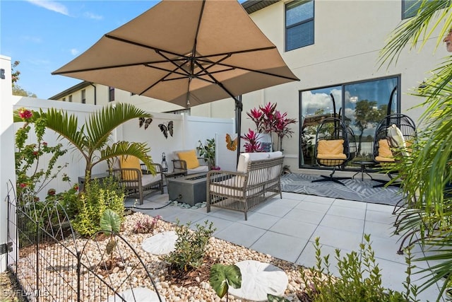 14127 Oviedo Pl, Fort Myers, FL 33905 - view of patio / terrace with fence and an outdoor living space