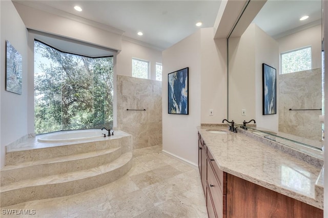 full bathroom featuring a garden tub, crown molding, recessed lighting, vanity, and walk in shower