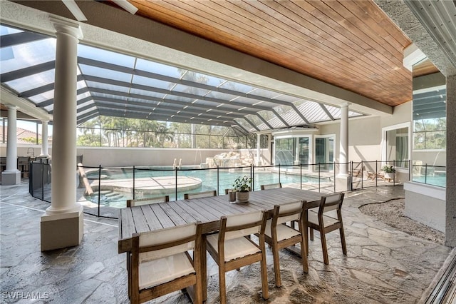 view of patio / terrace featuring a lanai and a fenced in pool