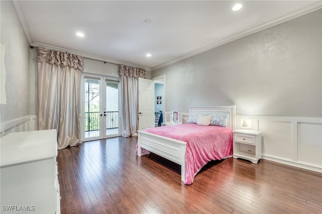 bedroom featuring access to outside, french doors, dark wood-type flooring, and crown molding