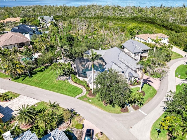 aerial view with a residential view and a water view