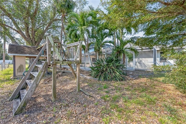 view of play area featuring a lanai