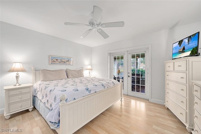 bedroom featuring access to exterior, french doors, a ceiling fan, light wood-type flooring, and baseboards