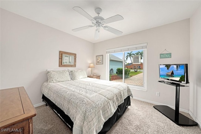 bedroom featuring access to outside, baseboards, a ceiling fan, and light colored carpet