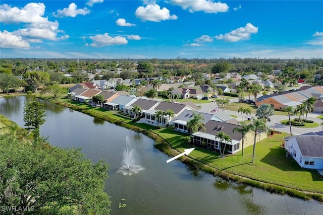 bird's eye view featuring a water view and a residential view