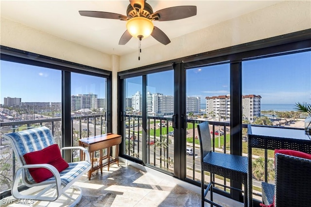 sunroom featuring a view of city