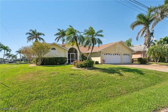 ranch-style house with a garage, driveway, a front lawn, and stucco siding