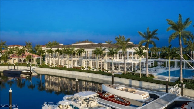 view of swimming pool featuring a water view and a boat dock