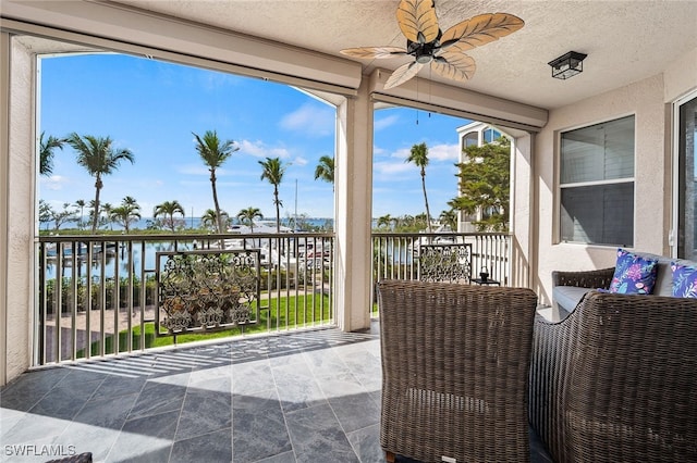 14328 Harbour Landings Dr Unit 18C, Fort Myers, FL 33908 - patio / terrace with a water view and ceiling fan