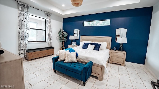 bedroom with marble finish floor, multiple windows, baseboards, and recessed lighting