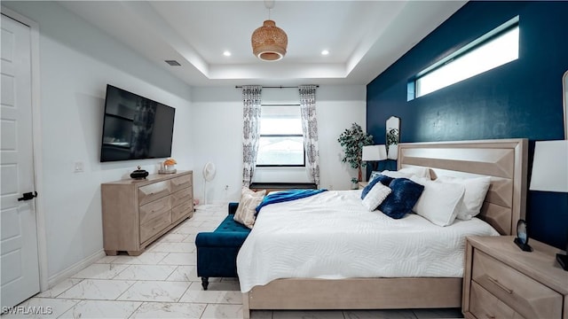 bedroom with recessed lighting, visible vents, baseboards, marble finish floor, and a tray ceiling