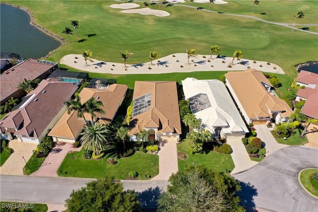 birds eye view of property featuring golf course view and a residential view