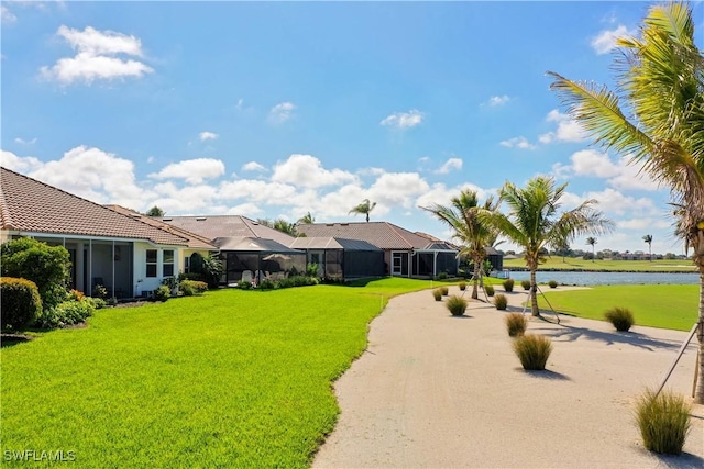 exterior space featuring a water view and a lanai