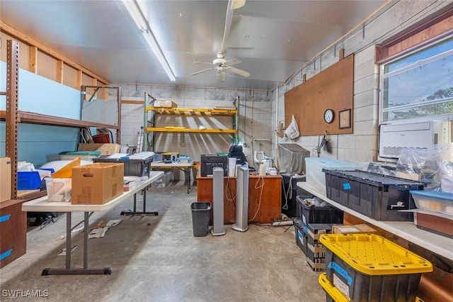 interior space with ceiling fan