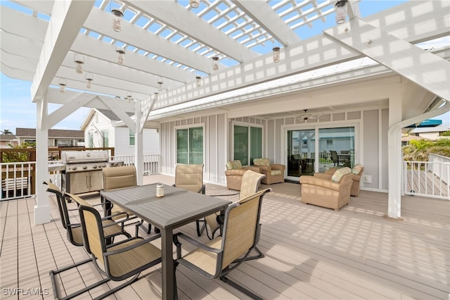 wooden deck featuring area for grilling, outdoor dining space, a pergola, outdoor lounge area, and ceiling fan