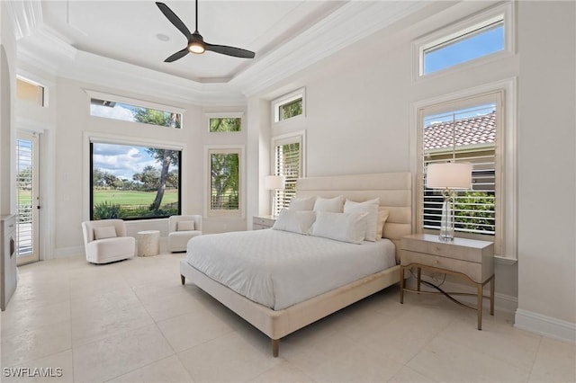 bedroom with baseboards, ornamental molding, and access to exterior