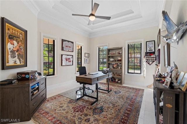 office area with a ceiling fan, a raised ceiling, crown molding, and light tile patterned floors