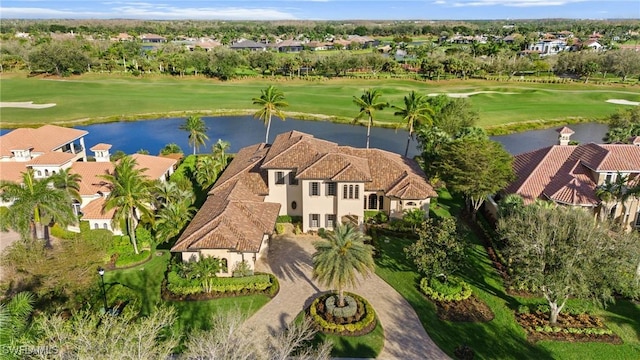 aerial view featuring a water view and golf course view