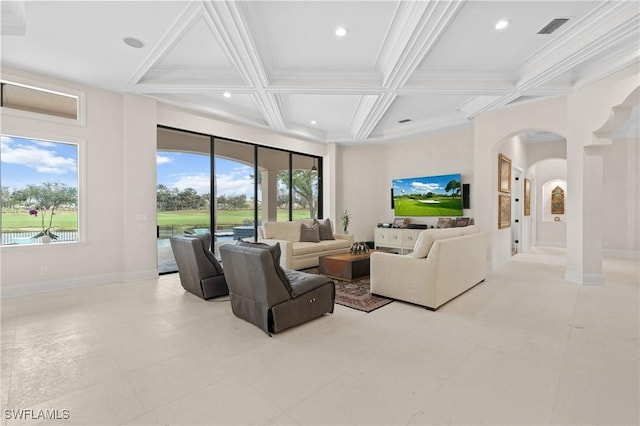 living room featuring arched walkways, coffered ceiling, visible vents, baseboards, and beam ceiling