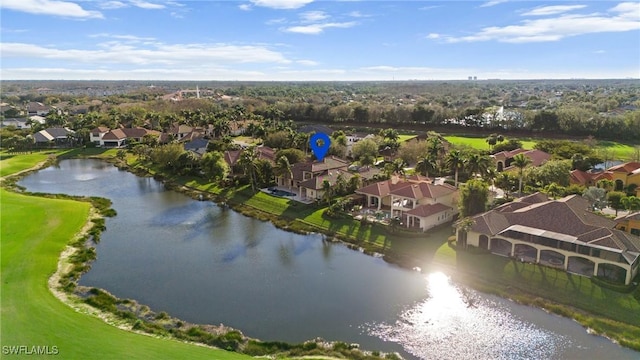 birds eye view of property featuring a water view and a residential view