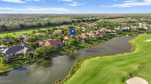 aerial view with a water view and a residential view