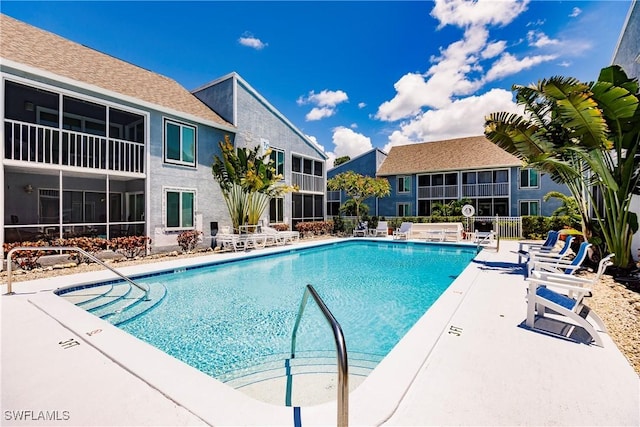 pool featuring a patio area