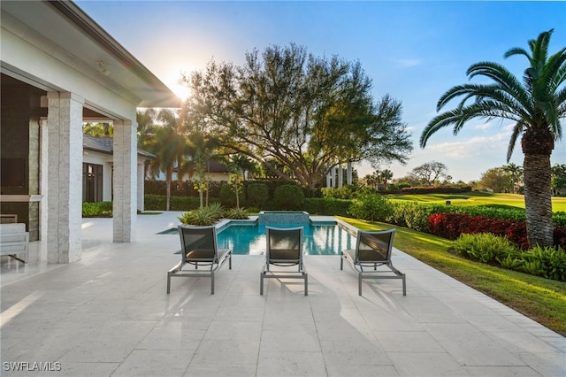 pool with a patio