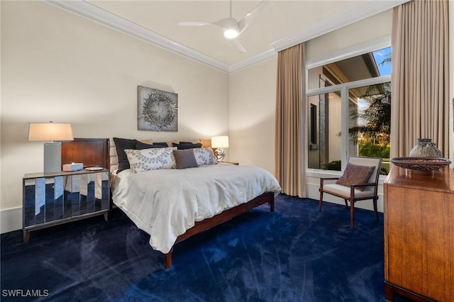 bedroom with ornamental molding, carpet, and ceiling fan