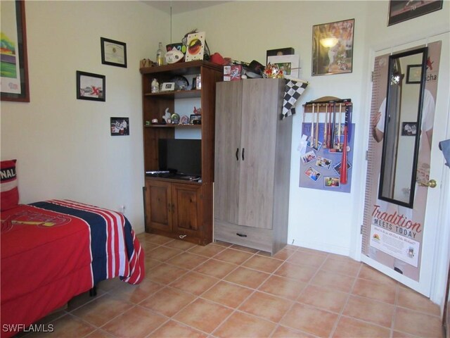 620 Mirror Lakes Falls Ct, Lehigh Acres, FL 33974 - view of tiled bedroom