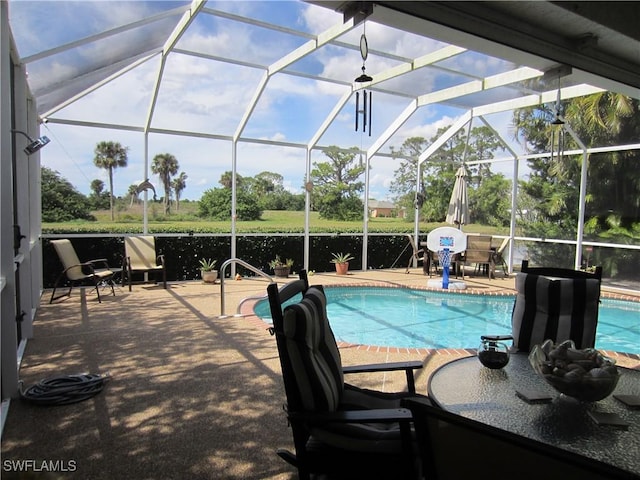 620 Mirror Lakes Falls Ct, Lehigh Acres, FL 33974 - outdoor pool with a patio and a lanai